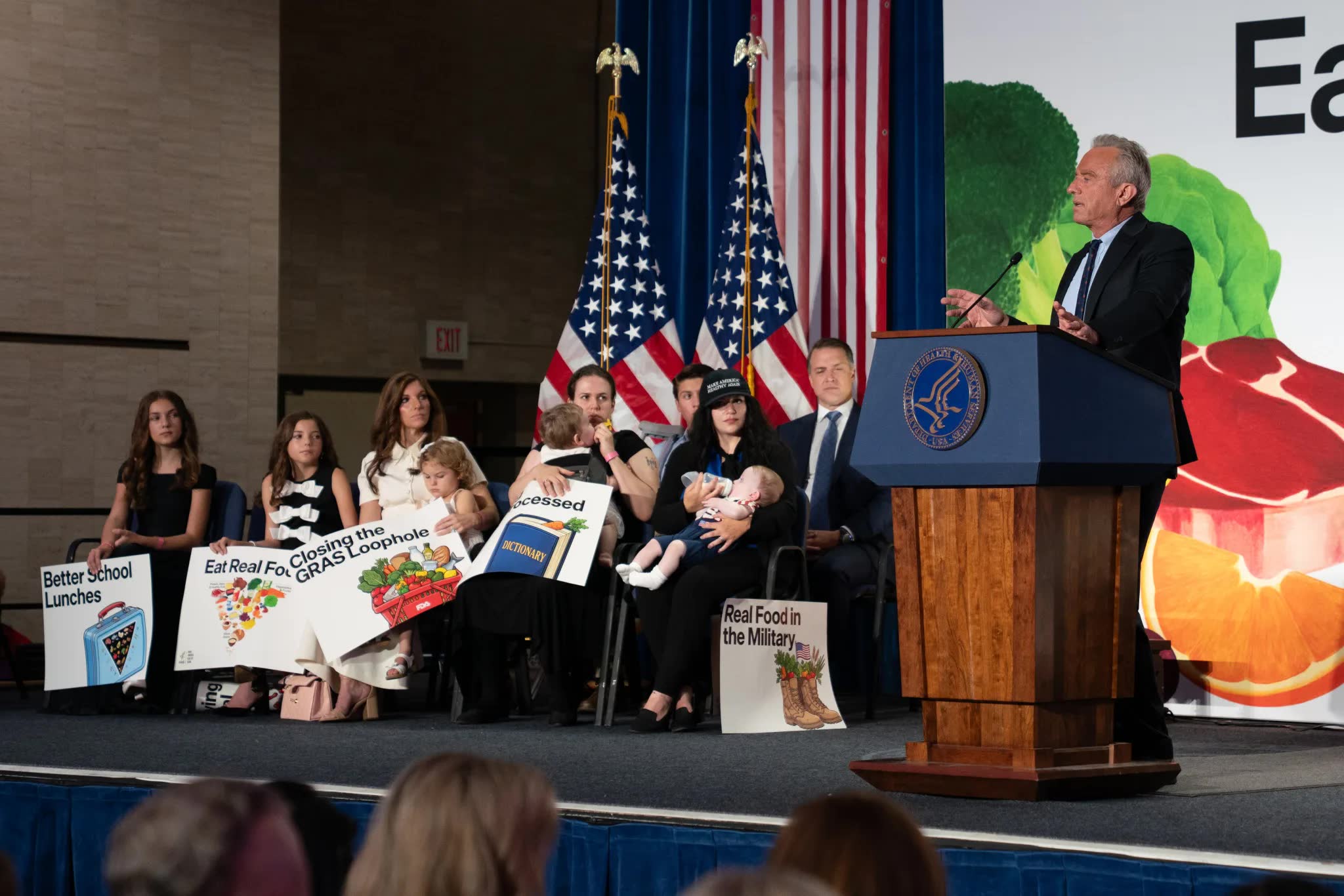 Health and Human Services Secretary Robert F. Kennedy Jr. speaks at HHS headquarters in Washington on Aug. 10, 2026, at an event the department described on social media as a rally and a celebration. A placard onstage reads “Closing the GRAS Loophole.” Photo: U.S. Department of Health and Human Services
